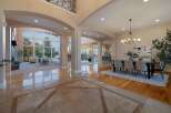 Step into luxury with this stunning property, showcasing an open-concept design and exquisite architectural details.
