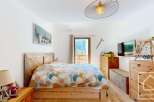 Discover the charm of this cozy bedroom, perfect for a relaxing retreat.