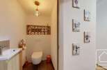 Discover this charming property featuring a stylish bathroom with modern fixtures and a unique design.