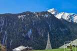 Discover your dream alpine retreat! This stunning property boasts breathtaking mountain views and a serene, natural setting.