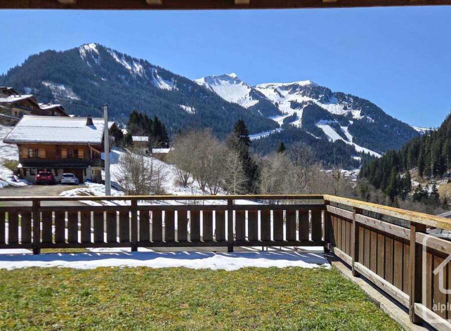 Experience breathtaking mountain views from this charming property.