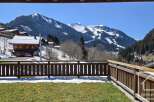 Experience breathtaking mountain views from this charming property.