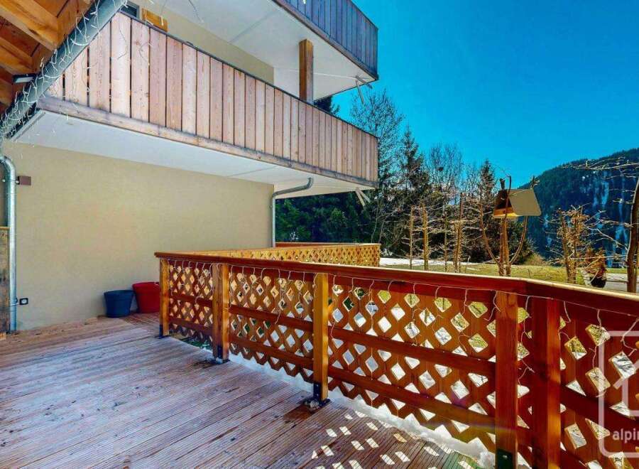 Discover the charm of this stunning property, featuring a beautifully crafted wooden balcony and deck.