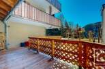 Discover the charm of this stunning property, featuring a beautifully crafted wooden balcony and deck.