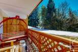 Enjoy breathtaking mountain views from this charming property.