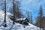 Nestled in a serene, snow-covered landscape, this charming property offers a perfect blend of tranquility and comfort.