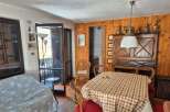 Step into this charming property and discover a cozy dining area, perfect for intimate gatherings.