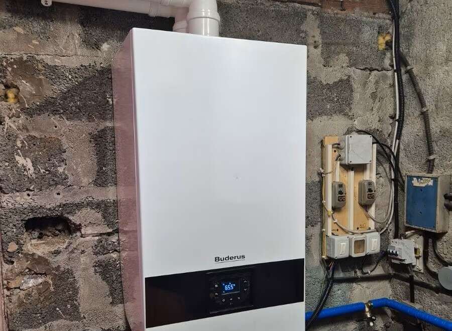 This property features a modern Buderus heating system, ensuring efficient and reliable warmth.