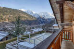 Experience breathtaking mountain views from this stunning property.