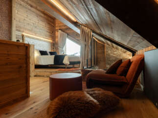 Experience rustic luxury in this stunning bedroom.