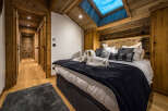 Experience the epitome of rustic elegance in this stunning bedroom.