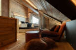 Experience rustic luxury in this stunning bedroom.