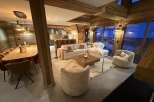 Experience luxury living in this stunning property featuring exquisite wooden accents and a cozy ambiance.