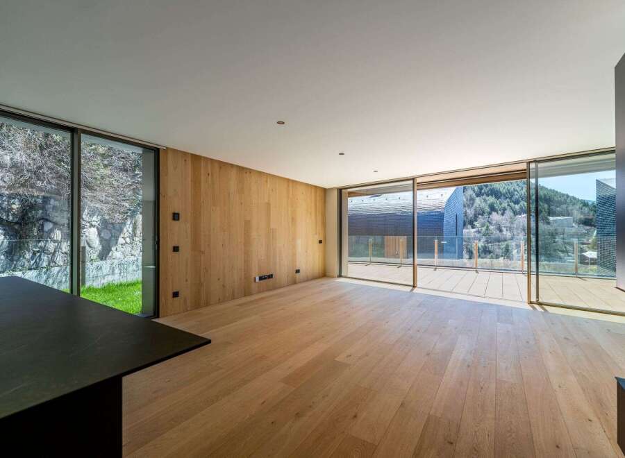 Experience luxury living in this stunning property featuring expansive windows that flood the space with natural light.
