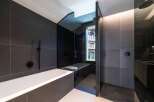 Step into luxury with this stunning bathroom featuring sleek, modern design.
