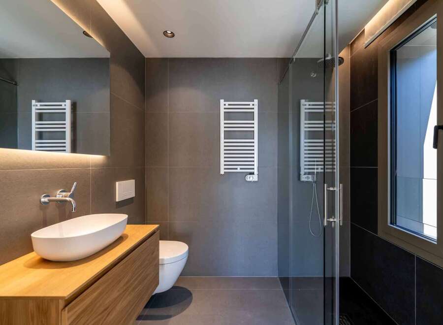 Step into modern luxury with this stunning bathroom.