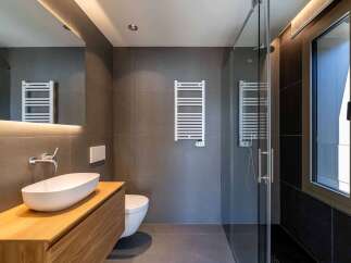 Step into modern luxury with this stunning bathroom.