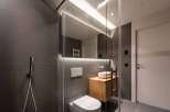 Step into modern luxury with this stunning bathroom design.