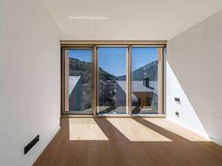 Experience breathtaking mountain views from this stunning property.