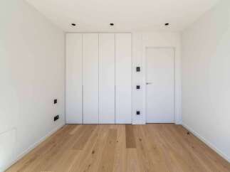 This modern room features a sleek design with a focus on functionality and style.