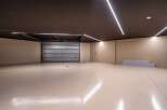 Discover the epitome of modern design in this stunning garage space.