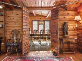 Step into rustic elegance with this stunning log cabin interior.