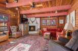 Step into rustic elegance with this stunning cabin-style living room.