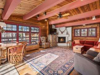 Step into rustic elegance with this stunning log cabin home.