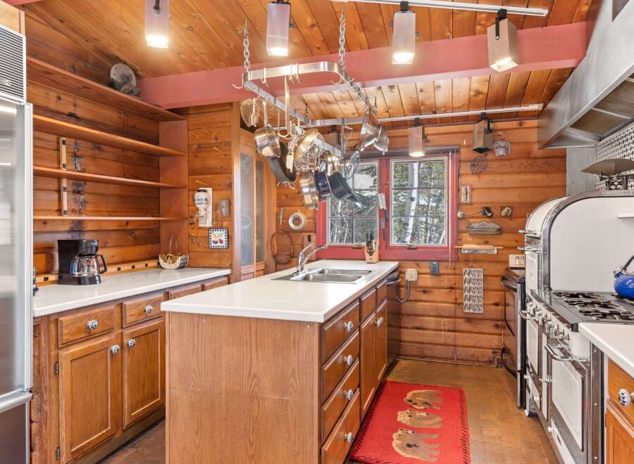 Step into the heart of this charming kitchen, where rustic elegance meets modern convenience.