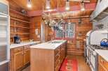 Step into the heart of this charming kitchen, where rustic elegance meets modern convenience.