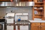 Step into a kitchen that blends vintage charm with modern convenience.