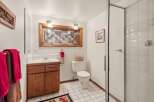 This inviting bathroom showcases a blend of functionality and style.