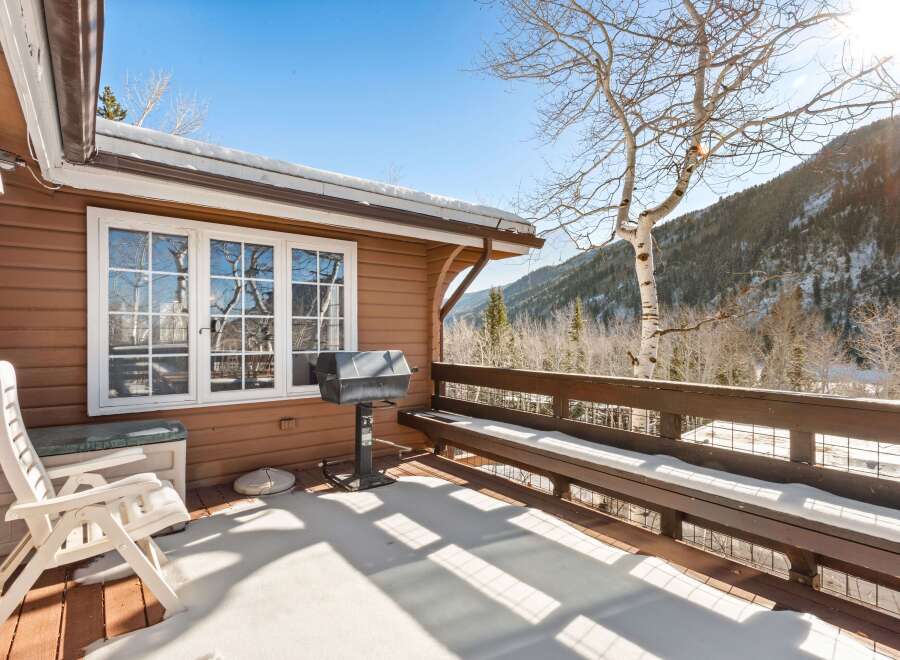 Enjoy breathtaking mountain views from this charming property.