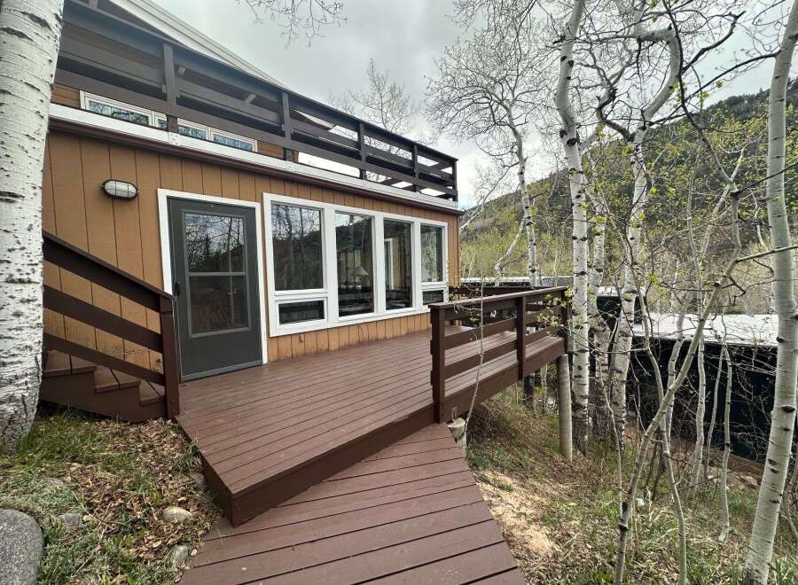 Discover the charm of this stunning property, featuring a spacious deck perfect for outdoor relaxation and entertaining.