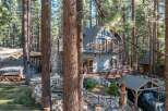 Nestled in a serene forest setting, this charming property offers a unique blend of rustic charm and modern comfort.