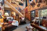 Step into rustic luxury with this stunning cabin-style home.