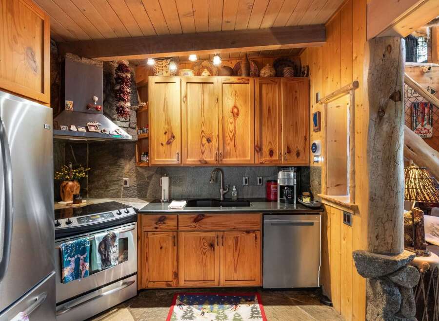 Step into the heart of this charming kitchen, where rustic elegance meets modern convenience.