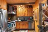 Step into the heart of this charming kitchen, where rustic elegance meets modern convenience.