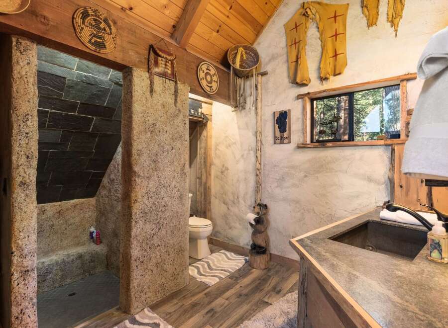 Step into rustic luxury with this unique bathroom design.