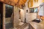 Step into rustic luxury with this unique bathroom design.