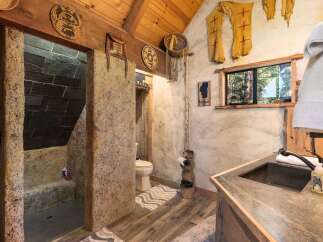 Step into rustic luxury with this unique bathroom design.
