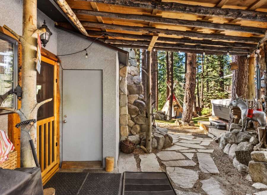 Escape to your own private oasis with this charming cabin nestled in the woods.