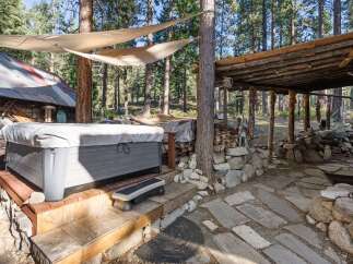 Escape to your own private oasis with this stunning property featuring a luxurious hot tub.