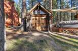 Discover a charming cabin retreat nestled in a serene wooded setting.