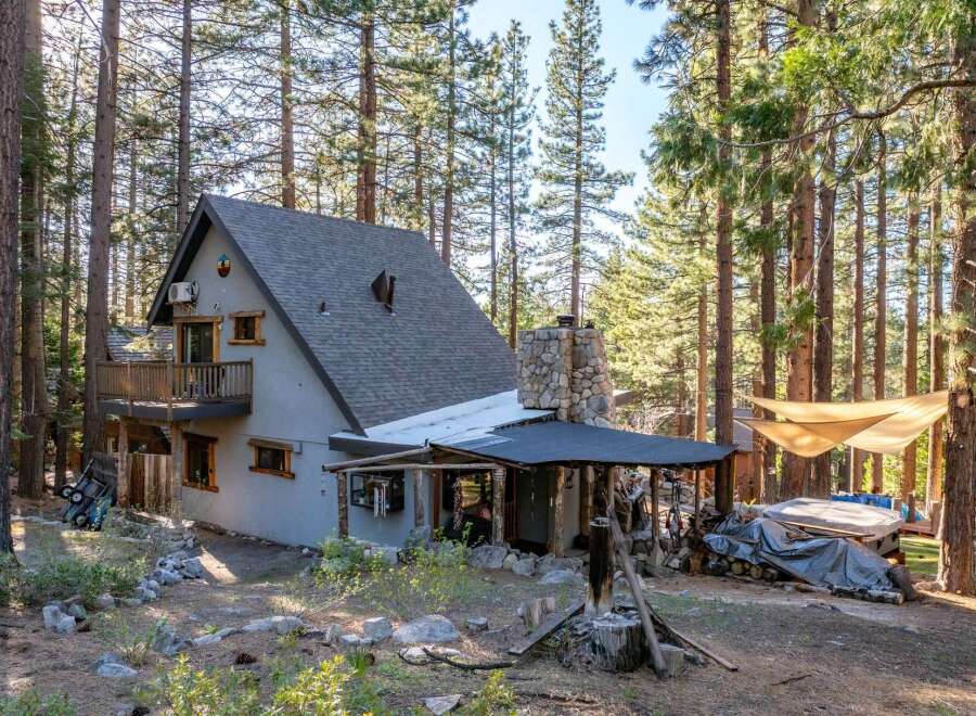 Nestled in a serene forest, this charming cabin offers a perfect blend of rustic charm and modern comfort.