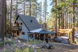 Nestled in a serene forest, this charming cabin offers a perfect blend of rustic charm and modern comfort.
