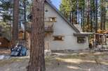 Nestled in a serene wooded setting, this charming property offers a unique blend of rustic charm and modern comfort.