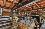 This property features a unique outdoor storage area, perfect for storing equipment or vehicles.