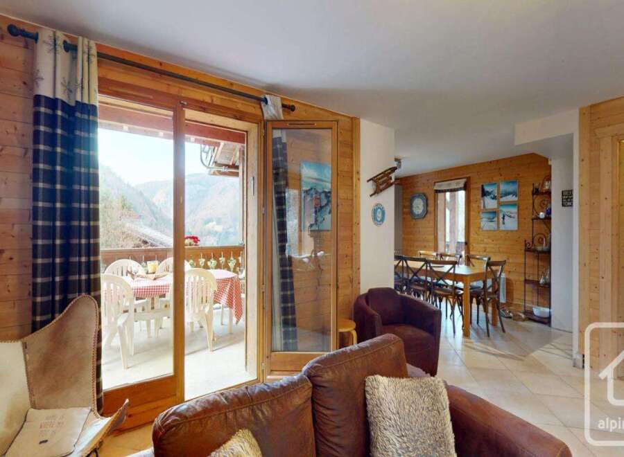Discover the charm of this stunning property, boasting a cozy living area with a beautiful view.