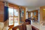 Discover the charm of this stunning property, boasting a cozy living area with a beautiful view.